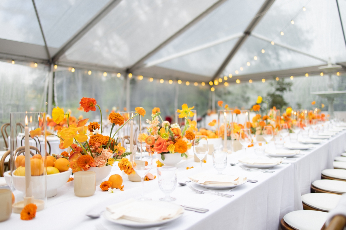 Orange themed rehearsal dinner with custom stationery and centerpieces by Remi + Gold at Commodore Perry Estate. | Rehearsal Dinner at Commodore Perry Estate | Owl & Envelope | Austin Wedding Vendor