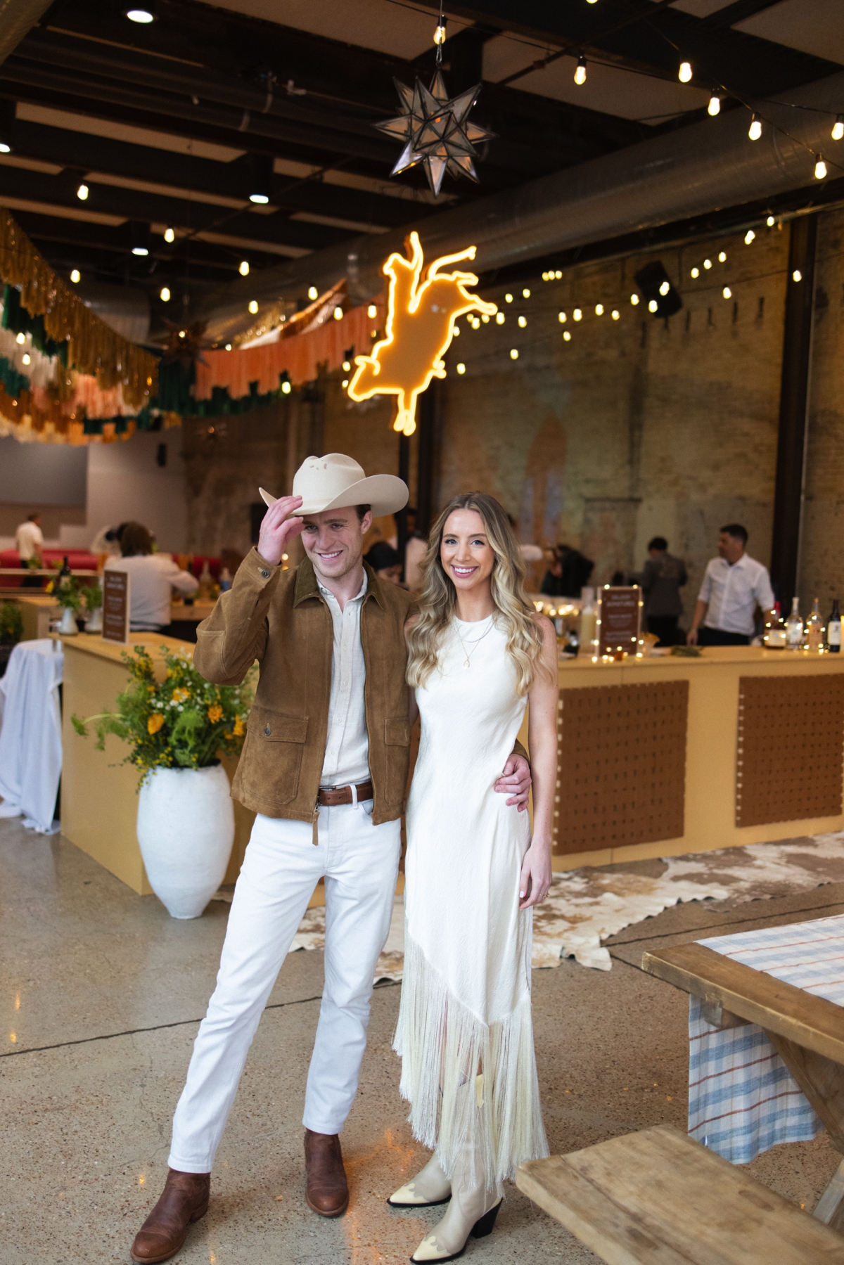 Welcome party signage at 800 Congress in Downtown Austin with mechanical bull and fun events for guests as they arrived for M+J's wedding weekend! | Owl & Envelope | Austin Luxury Wedding Vendor